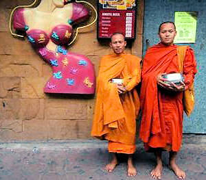 Photographic image of two monks in Patpong, Bangkok, Thailand