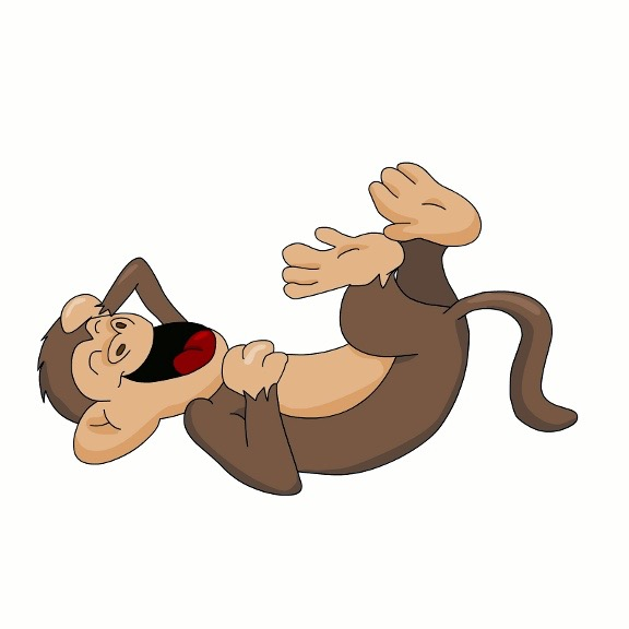 An image of a monkey who has fallen on the ground in laughter