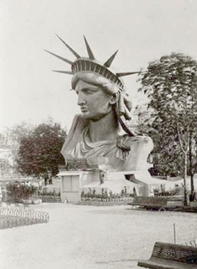A photograph of the head of the Statue of Liberty at a Paris exhibition in 1883